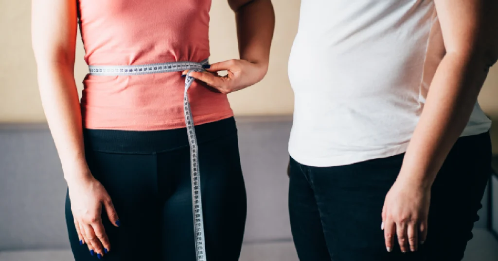 Women measuring with tape of her Weight loss in Scottsdale, AZ